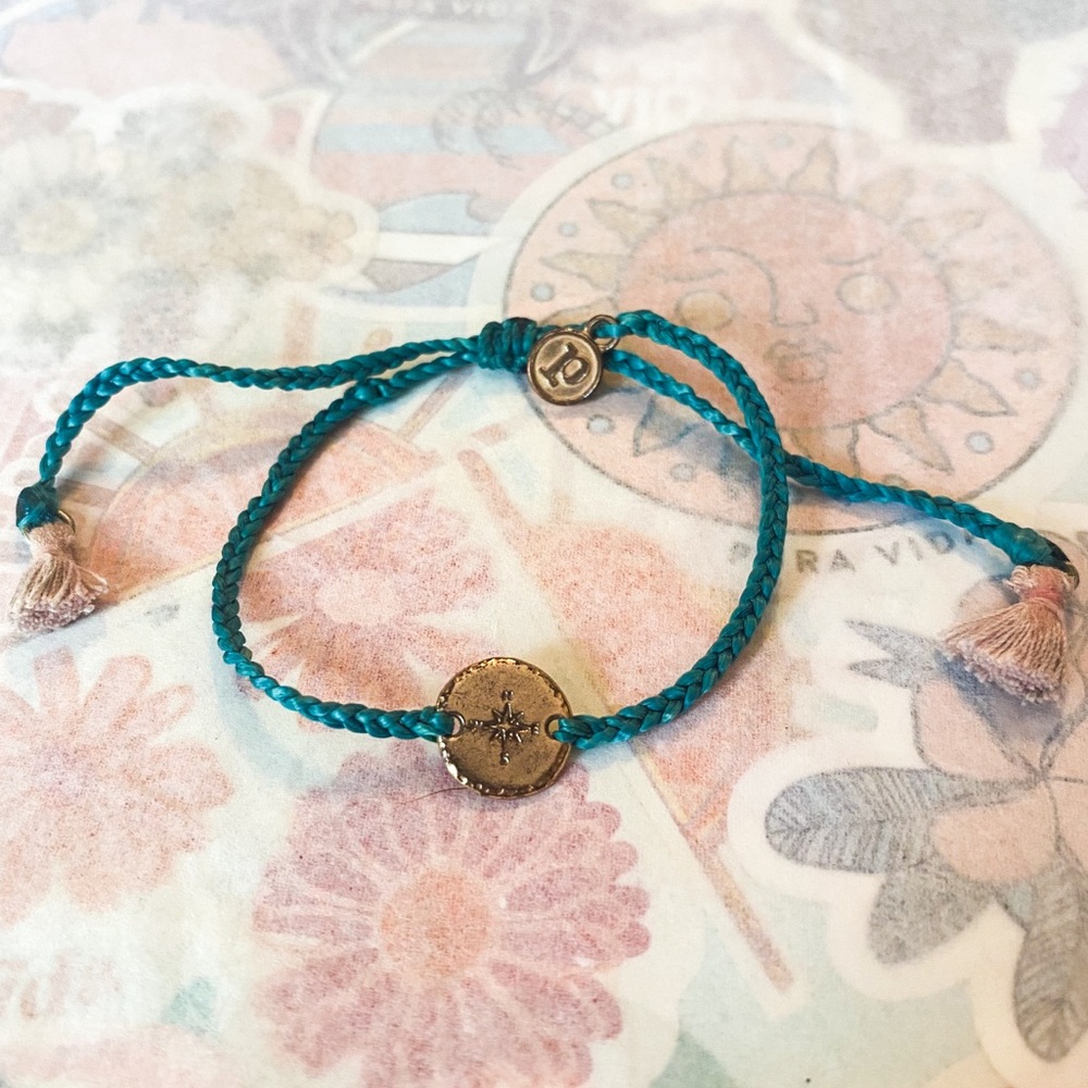 Pura Vida rose gold compass charm bracelet with tassels
